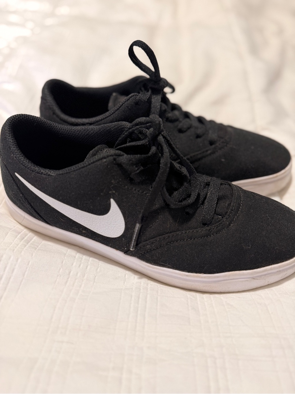 Nike Men’s Black Canvas Sneakers with White Swoosh Accent